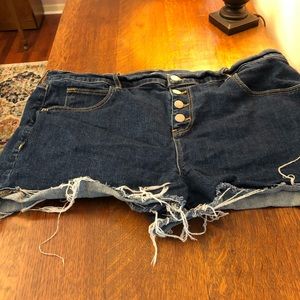 High waisted shorts with prominent fashion buttons